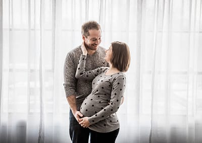 Pregnant lady and her husband in the studio. Owen Sound Family and Maternity Photographer