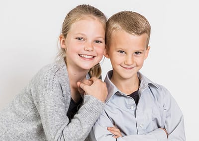 photo of a sister and brother in the studio. owen sound family photographer